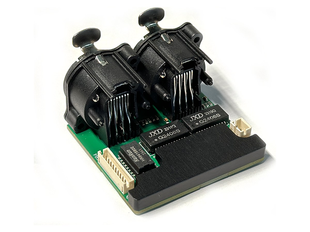 Gigabit FB4 network switch module with two locking panel-mount RJ45 connectors
